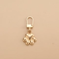 Golden heart paw shaped detachable zipper puller with secure spring lock U-clip - Footprint Gold
