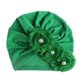 Detailed view of baby turban hat in bright green featuring soft fabric and pearl flowers - Green