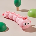 Giocattolo a molla bruco rosa con segmenti e grandi occhi per neonati che gattonano - Bruco / Rosa