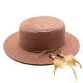 Detail of pink woven straw boater hat with bohemian feathers and beaded cord decoration - M (56-58cm) / Dusty Pink