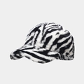 Close-up of zebra print faux fur baseball cap showing thick plush texture and warm material - Black and White Zebra Print