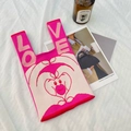 Charming rose pink knitted tote bag with cartoon heart motif and LOVE text handle - LOVE Rabbit