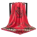 Red silk square scarf featuring leopard print borders and decorative golden chain motifs - 90x90cm / Orange Red