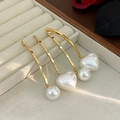 Elegant gold asymmetric earrings with heart and round pearls on soft velvet background - E6710-925 Sterling Silver Earring Post / White