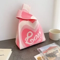 Pink and white heart pattern knit knot handbag featuring Love art typography - Pink-Hearts