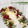 1.8m Christmas garland with red poinsettias, golden bows, and warm LED light strings - 1.8m Red and Gold Garland with Lights