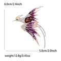 Elegant phoenix brooch with purple enamel wings and red crystal in golden finish - Purple