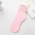 Pink velvet ice silk mid-calf socks with a ribbed texture and soft ruffled cuffs - One Size / Pink