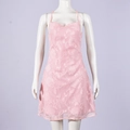 Detailed texture of pink mini dress featuring 3D floral embossed fabric and neck straps - S / Pink