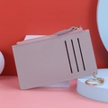 Pale purple leather zipper card holder with multiple slots and a gold keychain - Purple