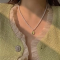 Collana vintage francese con perle bianche e ciondolo occhio di gatto verde chiaro - 25# Collana-Verde-Ovale