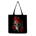 Detailed view of skull and red roses print on black canvas tote bag surface - Carved Texture Skull and Blooming Red Roses (hm6643)