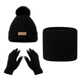 Close-up of black cable knit hat, scarf, and touchscreen gloves set with fur pompom and leather tag - Black