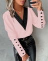 Women's pink V-neck long sleeve shirt featuring decorative black buttons and trim - S / Tops / Pink