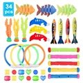 Set da 34 pezzi di giochi subacquei con anelli colorati, siluri e gemme su sfondo bianco - Set da 34 Pezzi