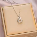Elegant silver titanium steel necklace featuring a sunflower pendant with clear zircons - 6039 Sun Flower / Silver