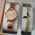 Close-up of rose gold watch and gold butterfly charm bracelet in a luxury display box - Rose Gold Watch Butterfly Bracelet Set