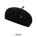 Classic black wool beret for women featuring a delicate gold bow metal ornament - M (54-58cm) / Black
