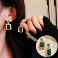 Orecchini pendenti con zircone verde smeraldo quadrato e finitura dorata - Orecchini di Smeraldo / Oro