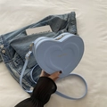 Fashionable light blue heart-shaped crossbody bag with gold zippers and adjustable strap - Blue