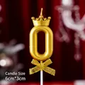 Gold number 0 birthday candle with crown and glitter bow detail, 6cm x 3cm size - Crown Bow Golden Number 0 Candle