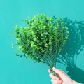 Handheld realistic eucalyptus bouquet with green plastic leaves for home decor - 7-Prong Money Grass