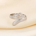 Close-up of silver snake-shaped open ring showing detailed scale texture and metallic shine - Snake Design (KR105283)