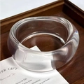 Minimalist wide clear resin bangle featuring an irregular thick design for women - Clear