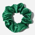 Close-up of deep green satin scrunchie with elegant pleated texture and silky gloss - Army Green
