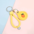 Cute yellow leather keychain with 3D orange charm and woven lanyard for access cards - Hand Strap Style - Orange