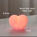 Mini heart shaped night light in warm pink finish with dimensions 8x6.5 cm - Small / Pink