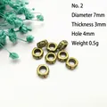 Dettaglio di perle distanziatrici in bronzo antico da 7mm con foro da 4mm per gioielli - 2# (Diametro 7mm/Spessore 3mm)