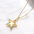 Polished gold pentagram star pendant on bead chain against white marble background - B-Smooth Star / Gold