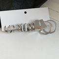 Set di orecchini a cerchio geometrici a C in argento lucido e perni rettangolari - Set da 12 pezzi / Argento