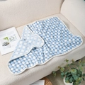 Soft blue and white polka dot coral fleece pet blanket for cats and dogs on a cozy sofa - Blue and White Polka Dots
