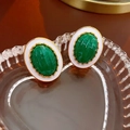 Vintage green enamel oval earrings with gold beaded edges on ripple glass surface - Oval Enamel Green Gemstone Earrings