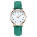 Close-up of a women's luminous quartz watch with green suede strap and rose gold case - Green