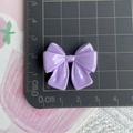 Top-down view of a purple resin bow accessory measuring 2.5cm by 3.5cm on a ruler - Purple Double Layer Bow / Purple