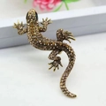 Vintage lizard brooch in antique gold with sparkling champagne rhinestones on white backdrop - Champagne and Dark Brown Rhinestones