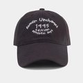 Close-up of vintage athletic embroidery on a black cotton twill baseball cap - Adjustable / Gray
