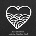 Macro shot of 22x22mm heart shaped stainless steel pendant with wave pattern detail - Silver Heart Sea Wave (22x22mm)