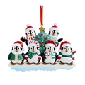 Christmas penguin family ornament with six penguins around a tree and red hanging ribbon - 6 Penguins Resin