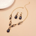Parure de bijoux dorés avec pierres en goutte d'eau violettes et cristaux brillants - Collier-Violet (Ensemble de 2 pièces)