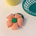 Cute sunflower hair tie with orange and white checkered fabric and green elastic band - Orange Checked Flower