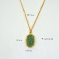Detail of 14K gold plated necklace with green stone pendant and measurement markings - African Jade