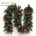 Deluxe 210cm Christmas garland with pine needles, cones and red berries on white background - White Flocked PE Mixed Rattan with Round Pine Cones and Red Berries / 2.1 Meters