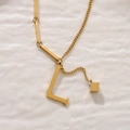 Golden titanium steel necklace with letter L pendant and cube charm on mixed chain - Gold Initial L (8847)