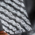 Self-adhesive nail art stickers with white wave lace patterns and mesh textures - TS-687 Spray-Flat