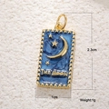 Macro detail of The Moon tarot card pendant with blue enamel and gold stars engraving - Tarot The Moon Style (Gray)