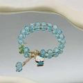 Multi-strand pearl and sea blue beaded bracelet featuring a Hello Kitty charm - S020-blue Cat Bursting Flower Ufo Bracelet #sz436